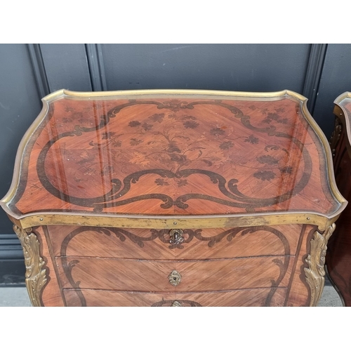 1050 - A good pair of early 20th century, Louis XV style, tulipwood, marquetry and gilt metal mounted gueri... 