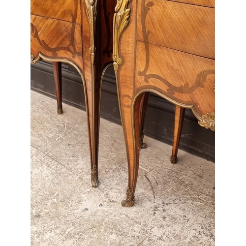 1050 - A good pair of early 20th century, Louis XV style, tulipwood, marquetry and gilt metal mounted gueri... 