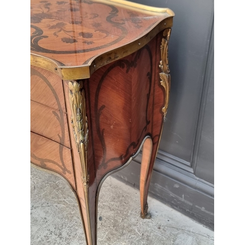 1050 - A good pair of early 20th century, Louis XV style, tulipwood, marquetry and gilt metal mounted gueri... 