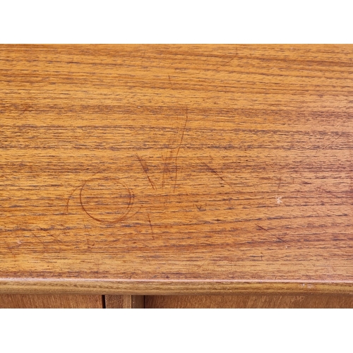 1052 - A mid-century G-Plan teak sideboard, 205.5cm wide.