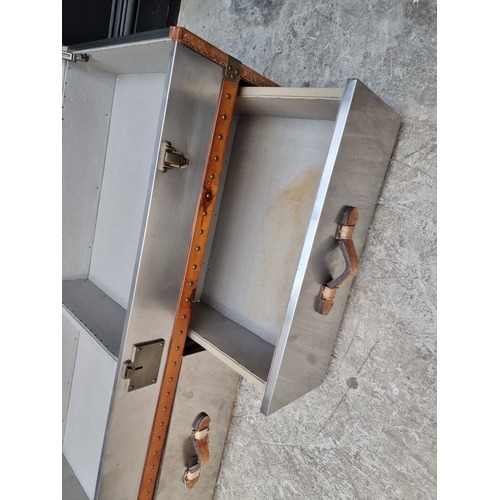 1078 - A reproduction polished aluminium and leather steamer trunk, from Feather & Black, 51cm high x 1... 