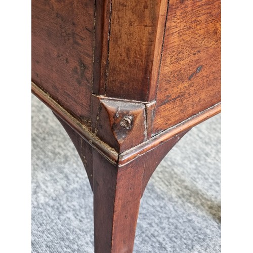 1040 - A George III mahogany cellarette, 42cm wide.