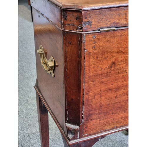 1040 - A George III mahogany cellarette, 42cm wide.