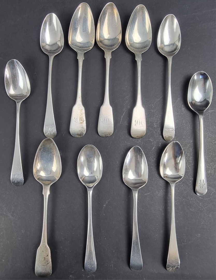 A set of four George III Irish silver fiddle pattern teaspoons, by ...