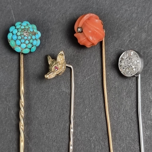A diamond set tie pin, 46mm high; together with a 9ct gold fox head ...