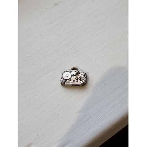 1605 - A rare Dunhill 'Unique' 9ct gold watch lighter, import mark 1926, with inscription to back 'To E.H.S... 