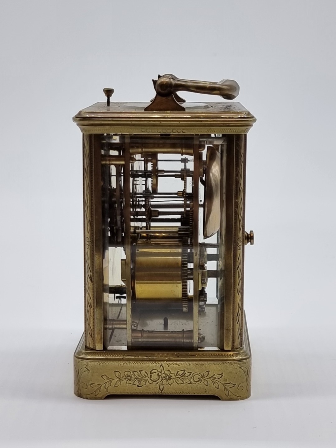 An antique brass carriage clock, with push button repeat and bell ...