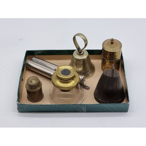 A mixed lot, to include a brass patent wax vestas box; a pocket ...
