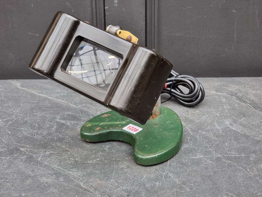 A vintage Hawk 'Lens Lite' desk lamp.