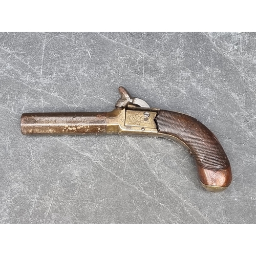 514 - Two antique percussion pocket pistols, with 10.5cm and 7.5cm octagonal barrels, (a.f.). (2)No licens... 