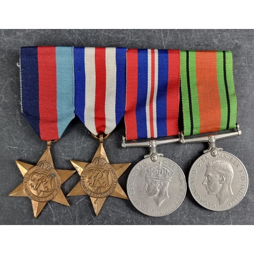 595 - Medals: a WWII group of four.
