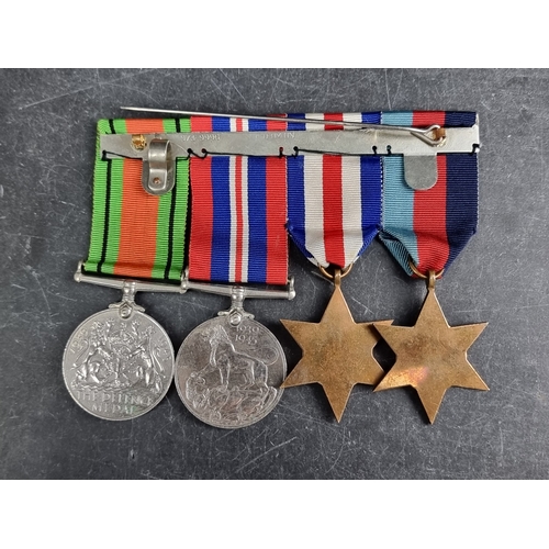 595 - Medals: a WWII group of four.