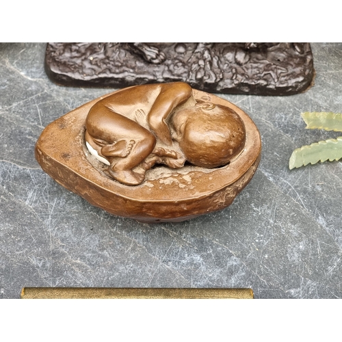 1219 - A mixed lot, to include: a cast iron hound, 21cm long; a Japanese carved wood figure, 10cm high; Chi... 