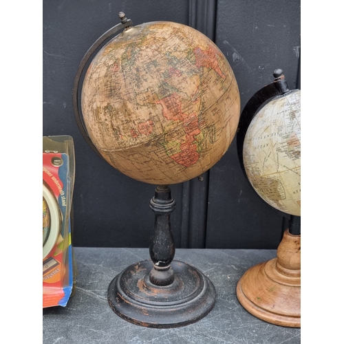 1222 - Five small table globes, to include a Geographia 6in example, 31cm high.