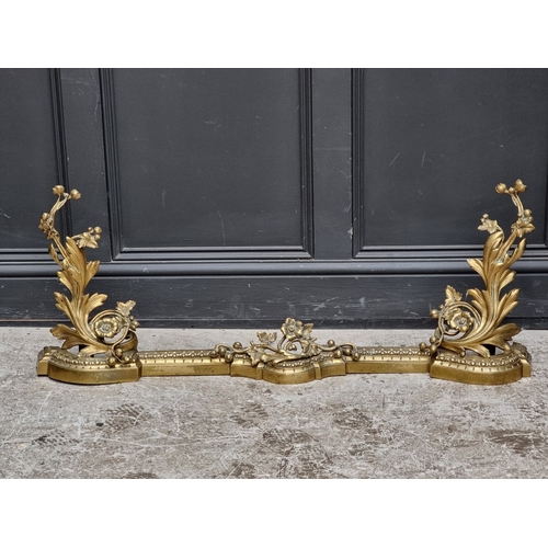 1227 - A rococo style cast brass adjustable fire curb, maximum 110cm wide.