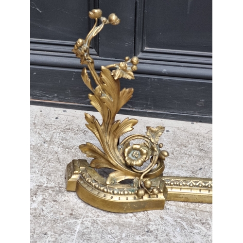 1227 - A rococo style cast brass adjustable fire curb, maximum 110cm wide.