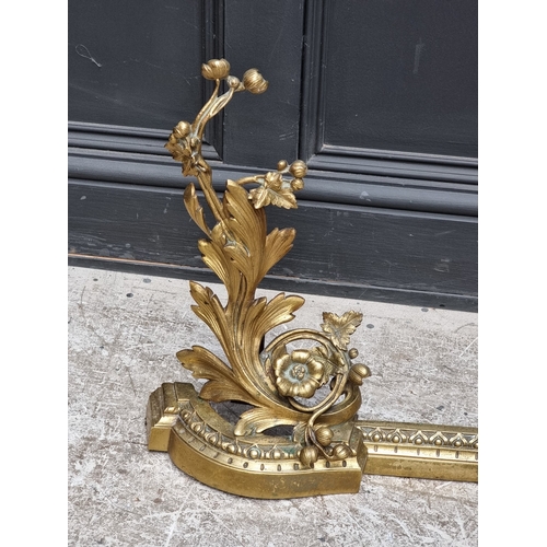 1227 - A rococo style cast brass adjustable fire curb, maximum 110cm wide.