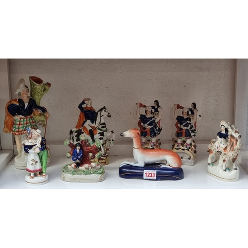 1233 - A collection of Victorian Staffordshire pottery; together with a later example. (8)