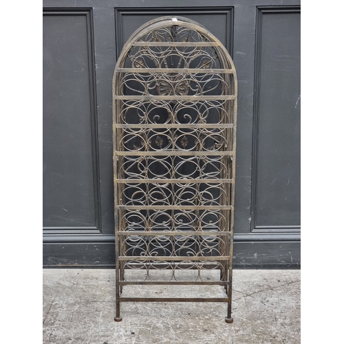 1251 - A steel thirty-seven bottle wine rack, 117cm high x 46cm wide x 34.5cm deep.