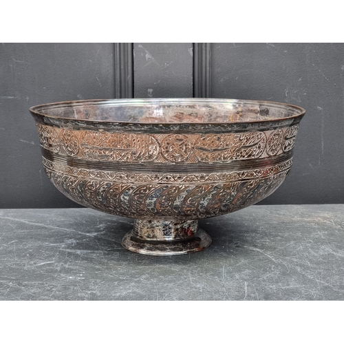 1307 - A large Persian electroplated pedestal bowl, inscribed with Islamic script, 34.5cm diameter.... 