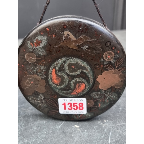 1358 - A Japanese spelter, bronze and inlaid figural combined bell and table gong, 22cm high.... 