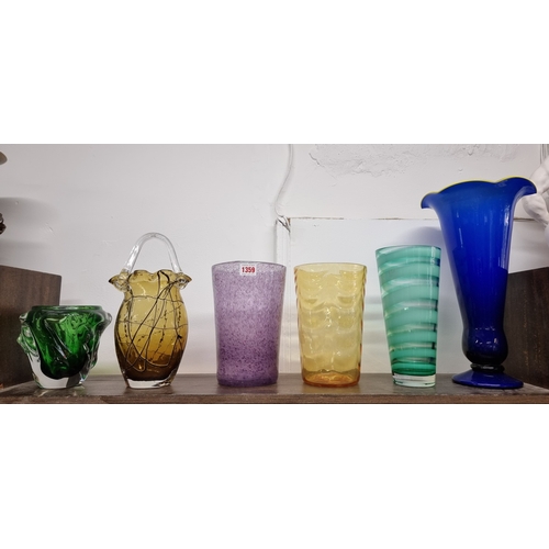 1359 - Six coloured glass vases, largest 39cm high.