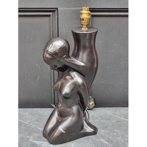 1367 - A pottery figural table lamp, total height 33cm.