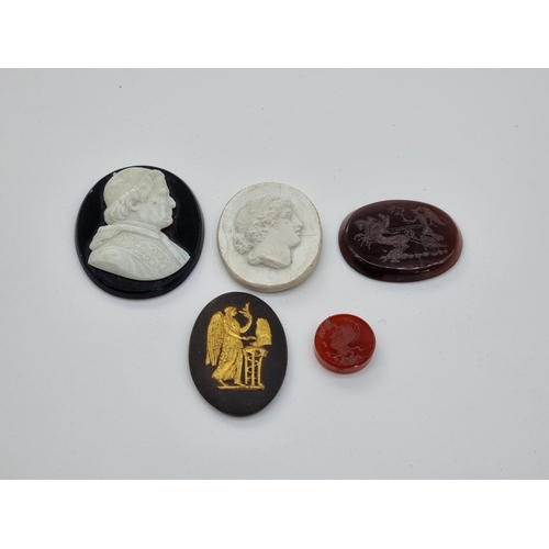 1376 - A small group of Grand Tour style cameos, intaglios and similar, largest 4.7 x 4cm. (5)... 