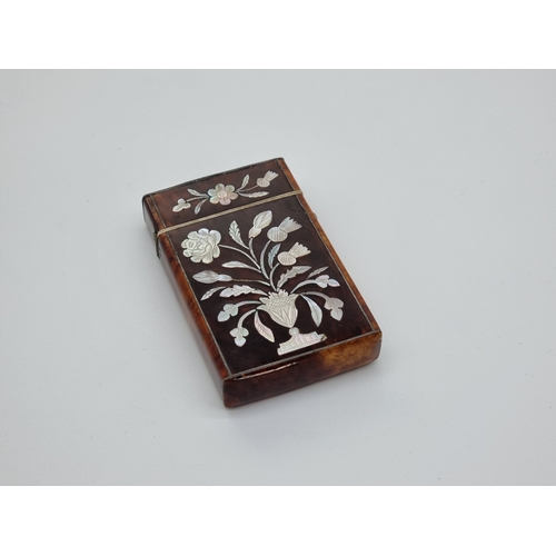1377 - A small Victorian tortoiseshell and mother-of-pearl card case, 8.2 x 5cm.