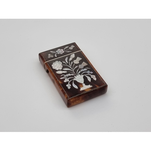 1377 - A small Victorian tortoiseshell and mother-of-pearl card case, 8.2 x 5cm.