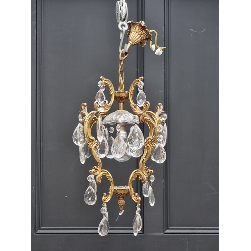 1398 - Two cast brass and faceted glass drop ceiling lights, maximum height of largest 70cm.... 