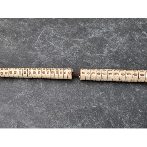 1400 - A novelty vertebrae and horn walking stick.