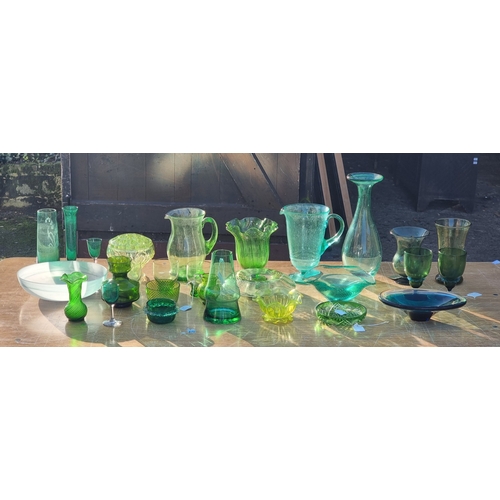 1421 - A collection of green glass.