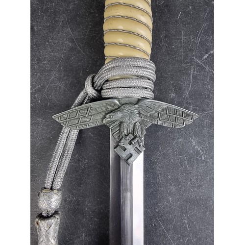 529 - A German Third Reich Luftwaffe Officers 2nd pattern dress dagger and sheath, by WKC, Solingen, with ... 
