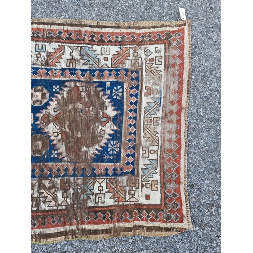 1013 - A Caucasian Kazak runner, having allover geometric decoration, 275 x 100cm.