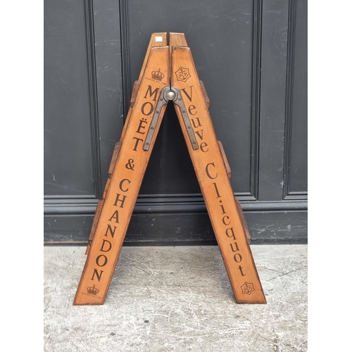 1020 - A pair of stained pine folding steps, 81.5cm high.
