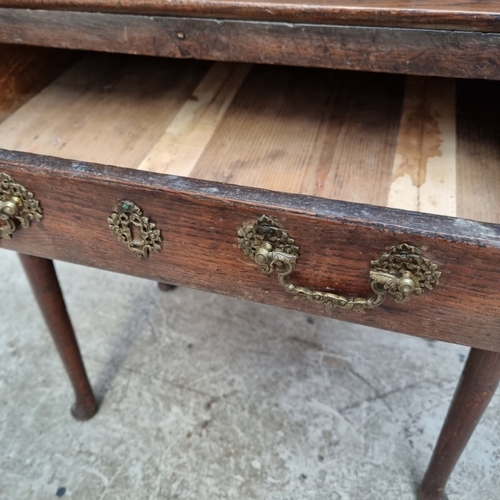 1052 - An 18th century oak single drawer side table, 76cm wide, (alterations).