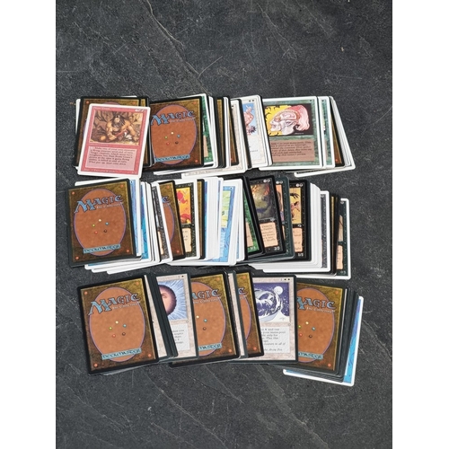 197 - MAGIC THE GATHERING: a quantity of loose cards, mostly dated 1994, 1995, 1996, and 1997; together wi... 