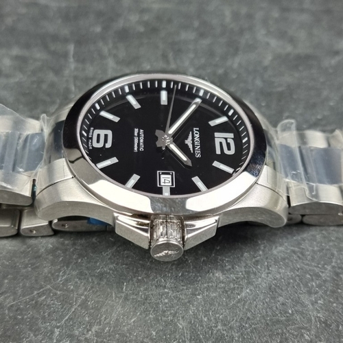 315 - A Longines 'Conquest' stainless steel automatic wristwatch, 41mm, Ref. L3.777.4, on original bracele... 