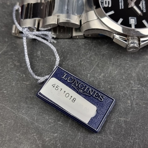 315 - A Longines 'Conquest' stainless steel automatic wristwatch, 41mm, Ref. L3.777.4, on original bracele... 