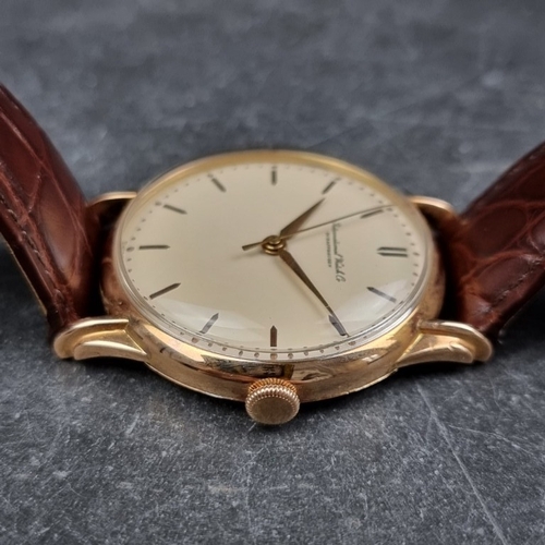 317 - A circa 1950 IWC Schaffhausen 18ct gold manual wind wristwatch, 34mm, Ref. 143, Cal. 89, on replacem... 