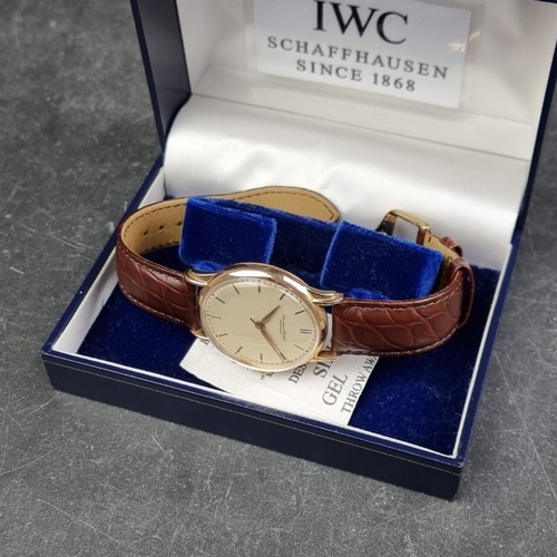 317 - A circa 1950 IWC Schaffhausen 18ct gold manual wind wristwatch, 34mm, Ref. 143, Cal. 89, on replacem... 