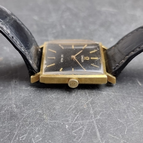 323 - A 1965 Omega 'De Ville' 18ct gold automatic wristwatch, 26mm, Ref. 161031, Cal. 671, on Omega black ... 