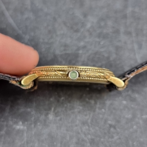 344 - A Bucherer 18ct gold manual wind wristwatch, 33mm, Ref. 7009 2, on Hirsch black leather strap.... 