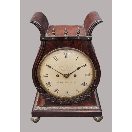 1138 - A good Regency rosewood and brass mounted lyre form twin fusee mantel clock, the 7in painted circula...