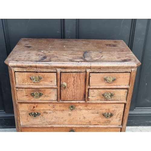 1014 - An unusual antique pine chest of drawers, 80cm wide.