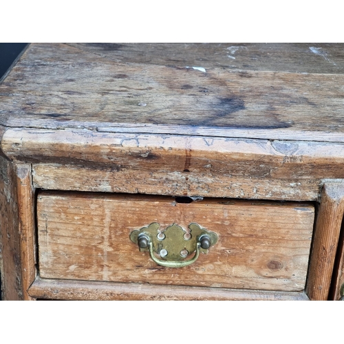 1014 - An unusual antique pine chest of drawers, 80cm wide.