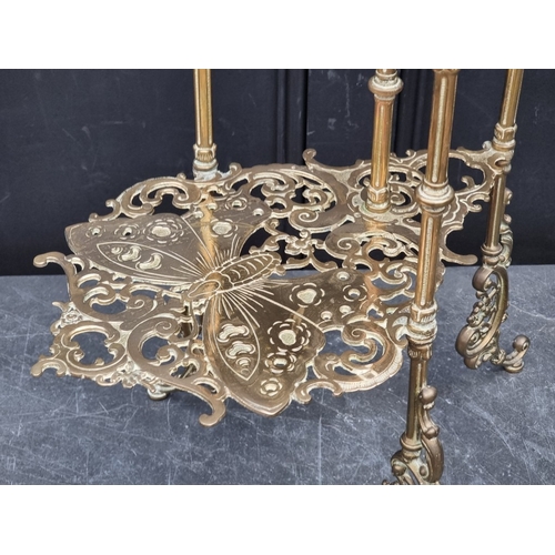 1020 - An unusual antique pierced brass plant stand, with three butterfly tiers, 77cm high.... 