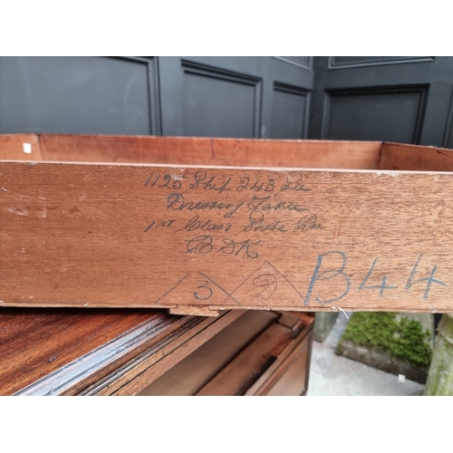 1031 - A vintage stained teak three drawer chest, with brushing slide, the back edge of one drawer inscribe... 