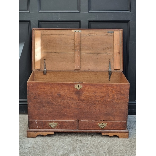 1034 - An 18th century oak mule chest, 109cm wide.